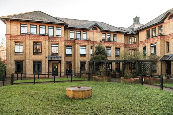 Exterior view of Hillyard House with garden area