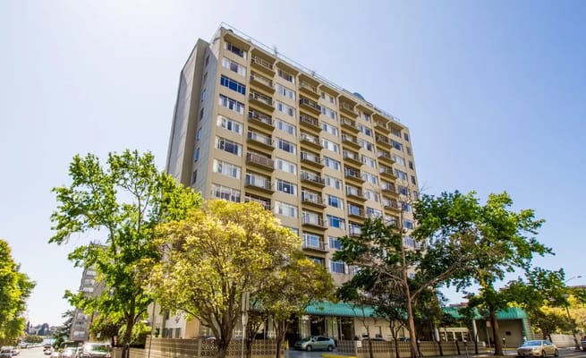 Exterior view of a multi-story senior living facility