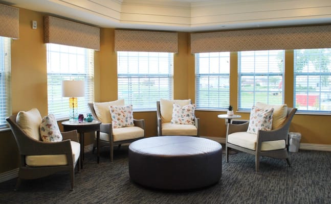 Cozy seating area in a common room with natural light