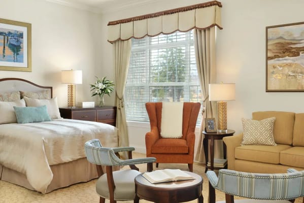 A well-furnished private resident room with natural light