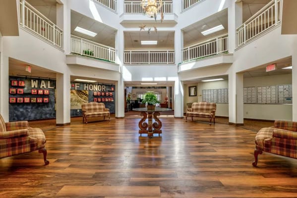 Interior view of a spacious common area with seating