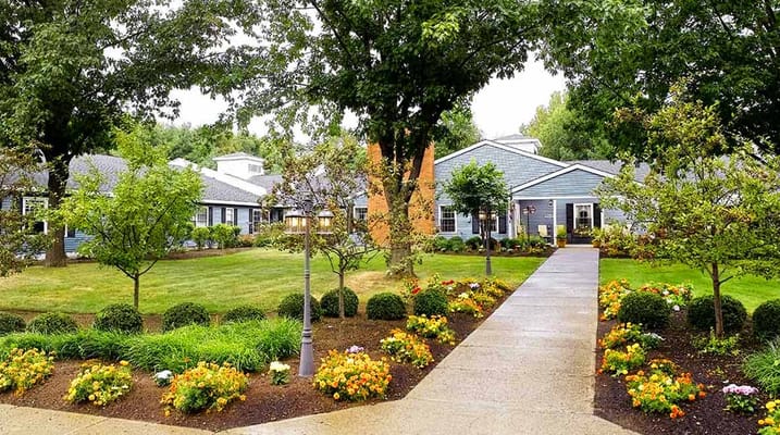 Beautifully landscaped outdoor space with pathways and flowers