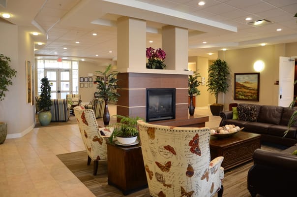 Welcoming lobby area with comfortable seating and plants