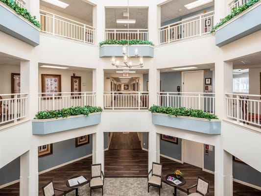 Bright interior common area with seating and decor