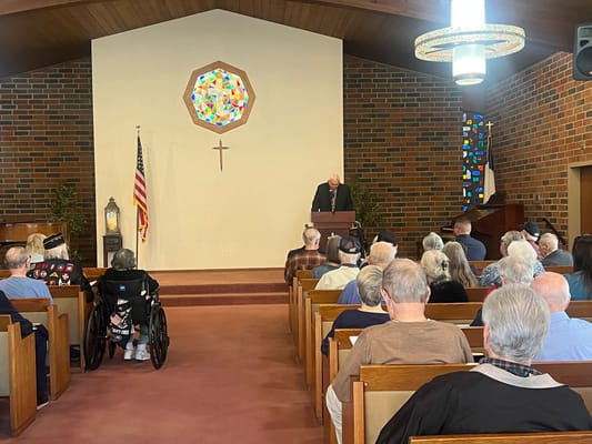 Residents attending a worship service in the chapel.