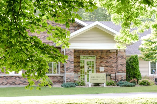 Exterior view of The Maples Assisted Living building