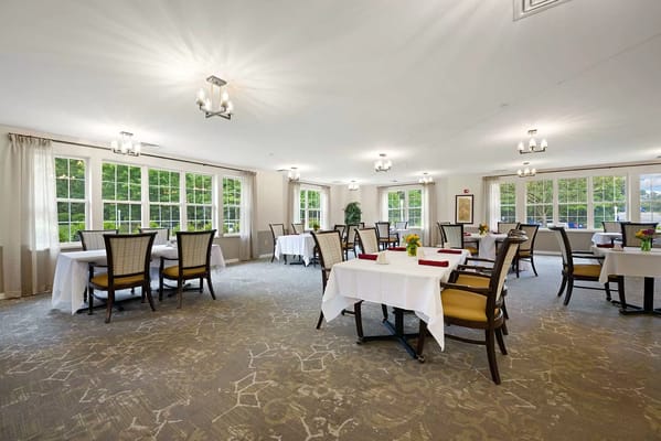 Bright dining area with tables and chairs at Seaton Chesterfield