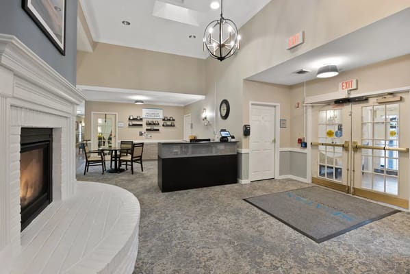 Bright and welcoming lobby area with seating and reception desk