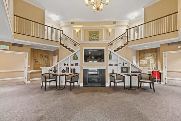 Interior view of the lobby area featuring seating and a fireplace