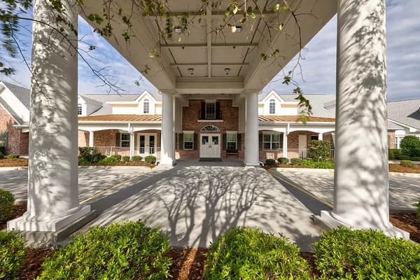 Exterior view of a senior living facility with entryway