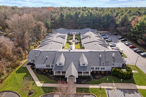 Aerial view of Summit Place Assisted Living showing landscaped grounds and buildings.