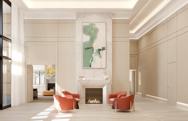 Cozy lounge with red chairs and a modern fireplace