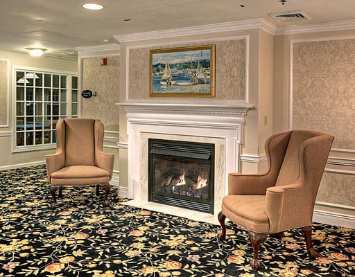 Cozy common area with fireplace and seating