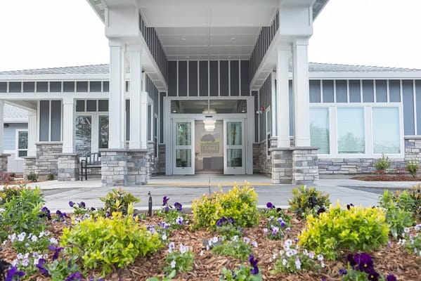 Exterior view of a welcoming assisted living facility entrance