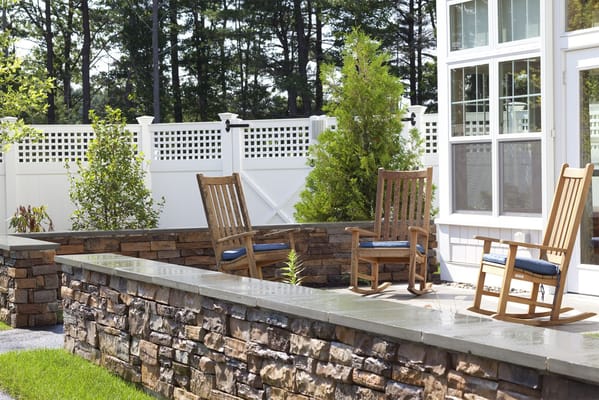 Outdoor seating area with rocking chairs