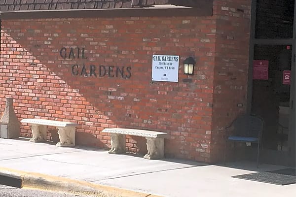 Exterior view of Gail Gardens Apartments building entrance