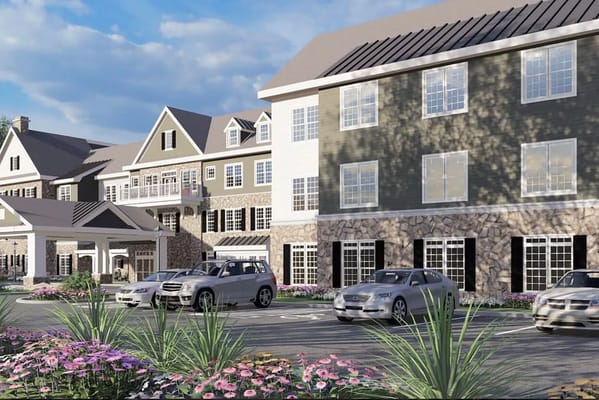 Exterior view of Arbor Terrace Exton with parking area