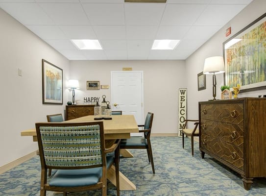 Bright common area with dining table and decorations