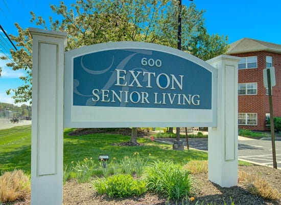 Signage displaying Exton Senior Living facility name