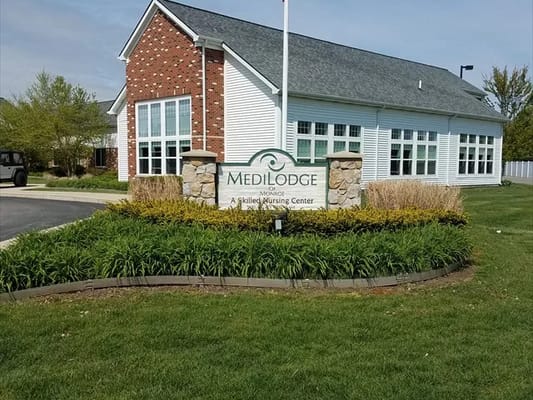 MediLodge of Monroe building entrance with logo sign