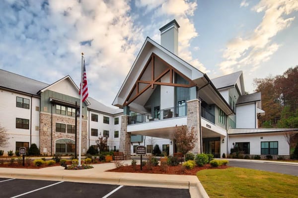 Exterior view of Longleaf Liberty Park with flag and landscaping