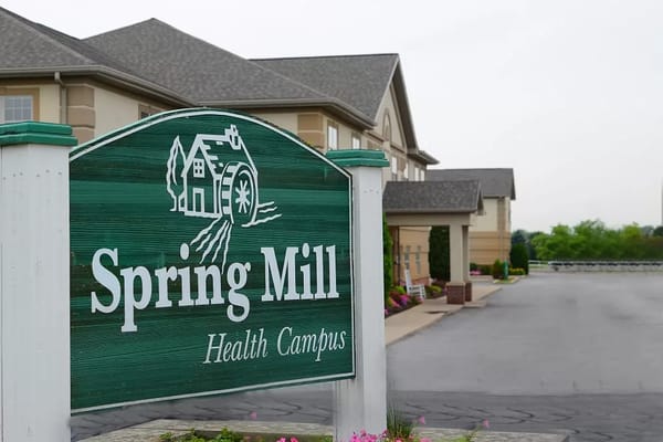 Signage for Spring Mill Health Campus at the facility entrance