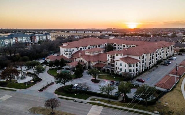 Aerial view of the Conservatory at Plano at sunset
