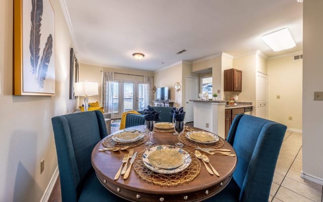 Dining table set up in a stylish common area