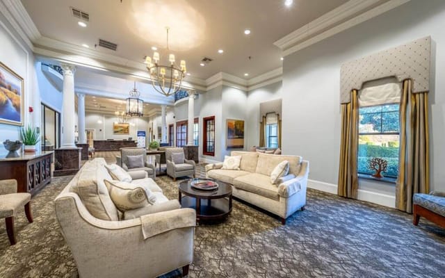 Interior view of a cozy common area with seating