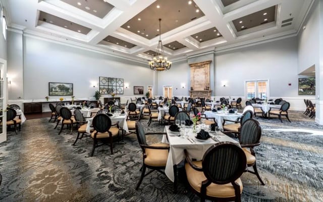 Elegant dining room setup with tables and chairs