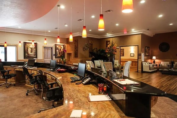 Bright interior of the facility lobby with seating and reception desk