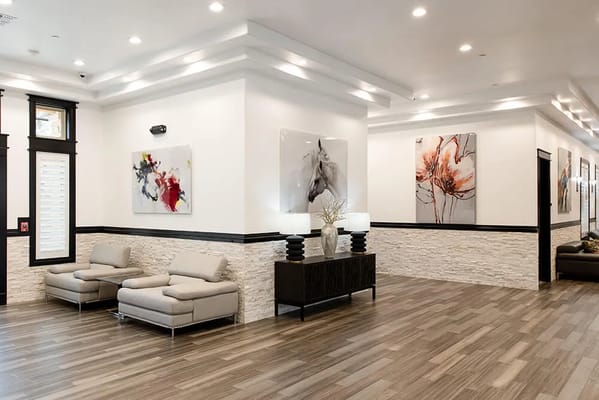 Bright and modern lobby area with seating and artwork