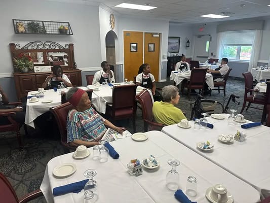 Residents enjoying a meal in the dining room