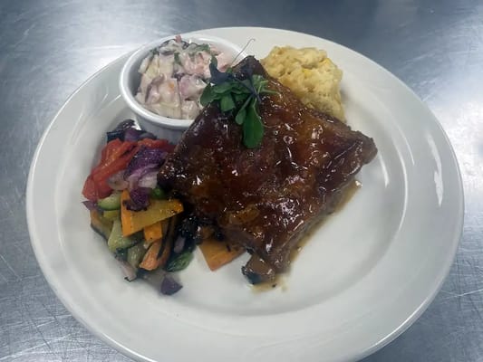 Plate of delicious meatloaf with sides