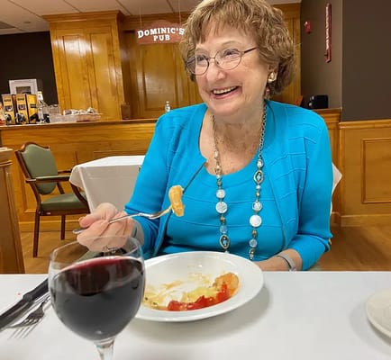 Resident enjoying lunch in the dining room