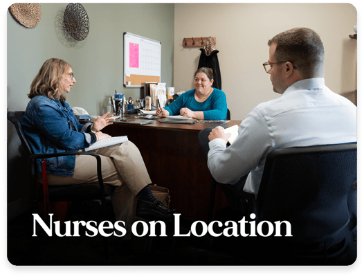 Nurses discussing in an office setting