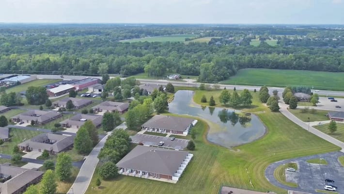 Aerial view of Heritage Assisted Living Yorktown campus and pond