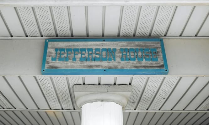 Sign indicating the name of the facility