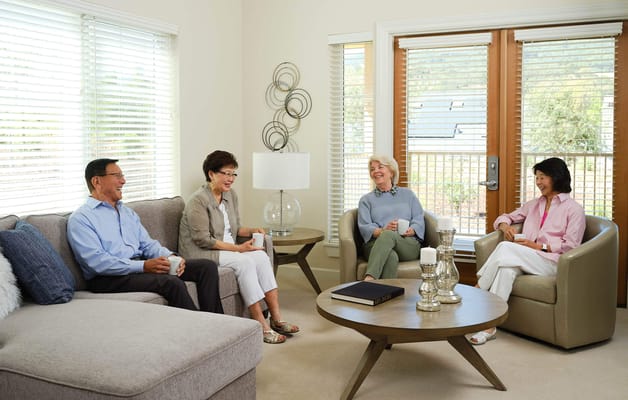 Residents enjoying conversation in a common area