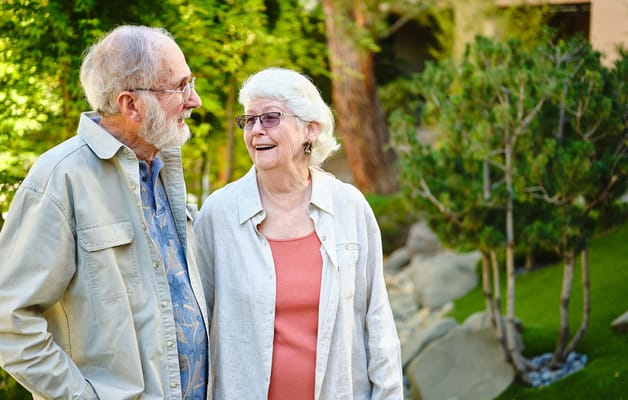 Couple enjoying a sunny moment in the garden
