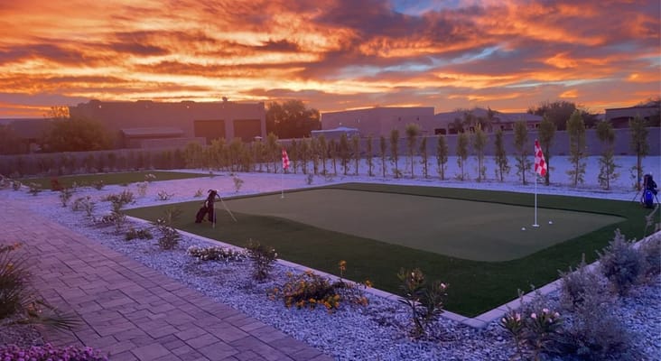 Outdoor putting green at sunset