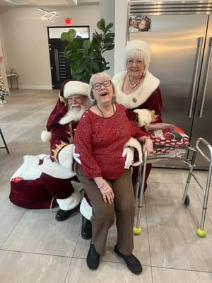 Residents enjoying a holiday celebration with Santa