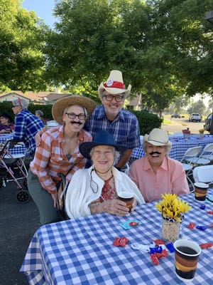 Residents participating in a festive outdoor activity.