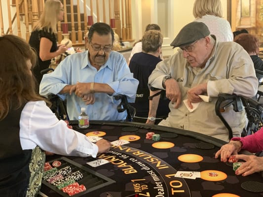 Residents playing blackjack at a community event