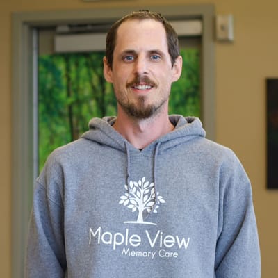 Staff member wearing a Maple View hoodie