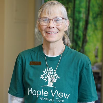 Staff member wearing a Maple View shirt