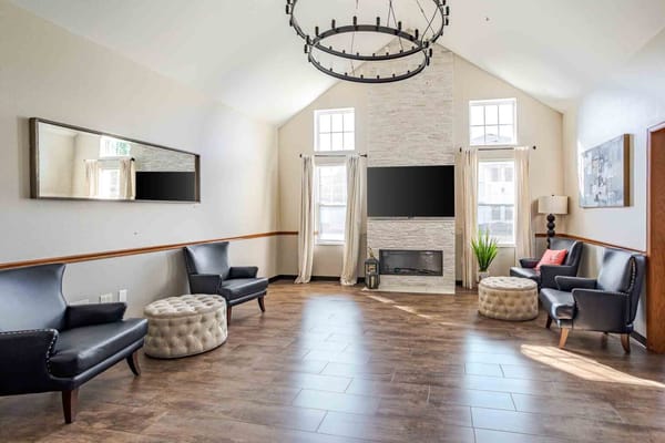 Interior common area with seating and large windows