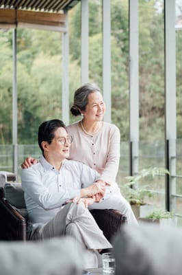 A couple enjoying time together in a bright common area