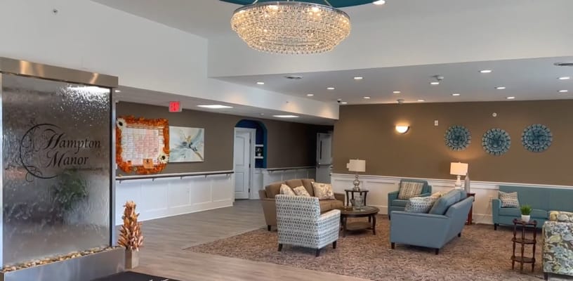 Interior view of a cozy lounge area at Hampton Manor