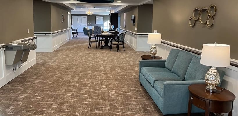 Interior view of a common area with seating and tables